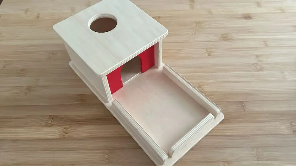 montessori object permanence box with tray and ball